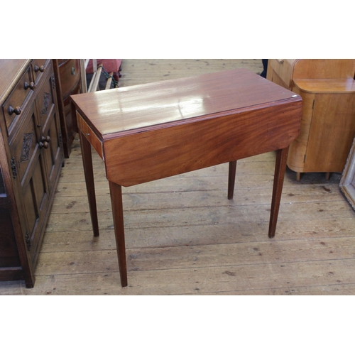 387 - A Mahogany Drop Flap Table with a Single Drawer.