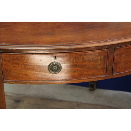 391 - A Georgian designed Beau Fronted Mahogany Side Table fitted with Two Drawers resting on square taper... 