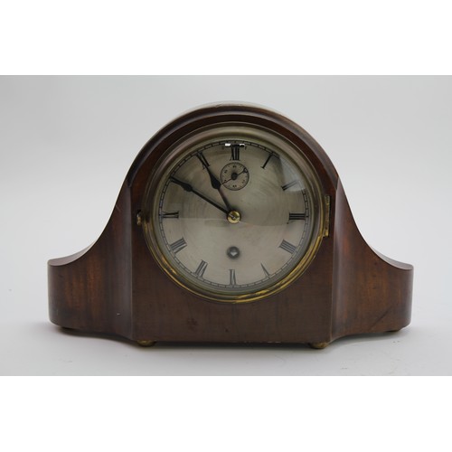 132 - A Victorian Bracket Clock with a Silver Dial.