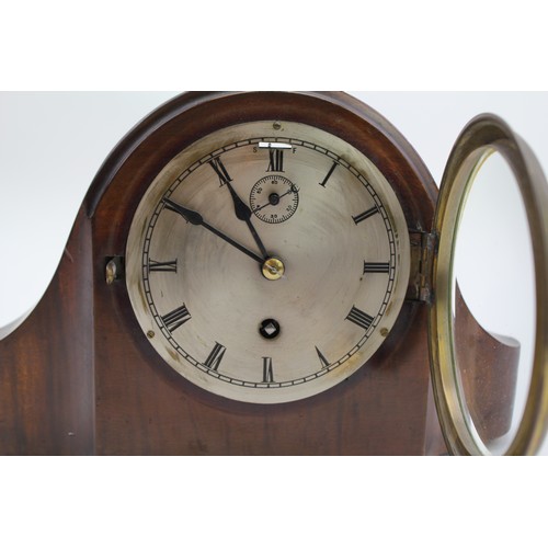 132 - A Victorian Bracket Clock with a Silver Dial.