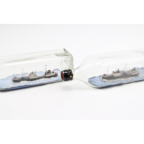 584 - Two Ships in Bottles to include M. Y. Atlantic Coast Ship and a Ocean Coast Ship.