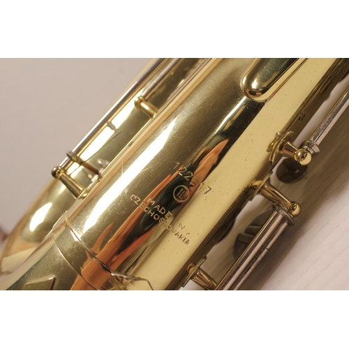 590 - A Corton Brass made Saxophone with mouth piece.