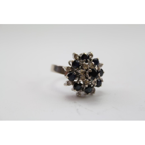 233 - A Ladies Italian design Sapphire Dress Ring mounted in 9 carat white gold. Size approx N.