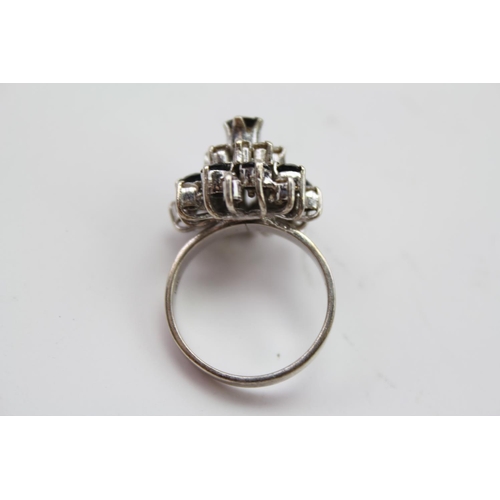 233 - A Ladies Italian design Sapphire Dress Ring mounted in 9 carat white gold. Size approx N.