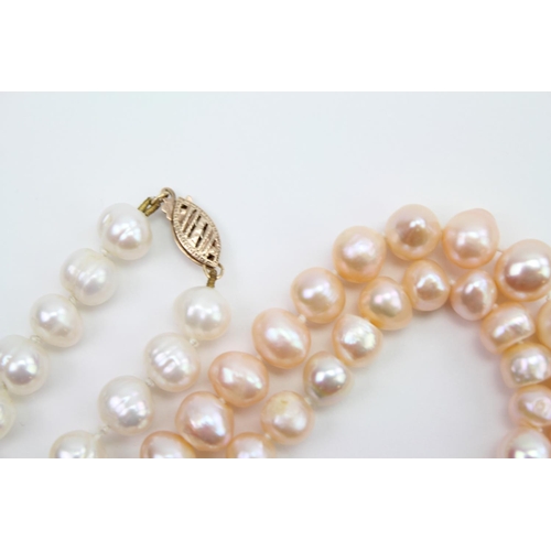 244 - A string of pink overtone 'pearl' necklace and one other.