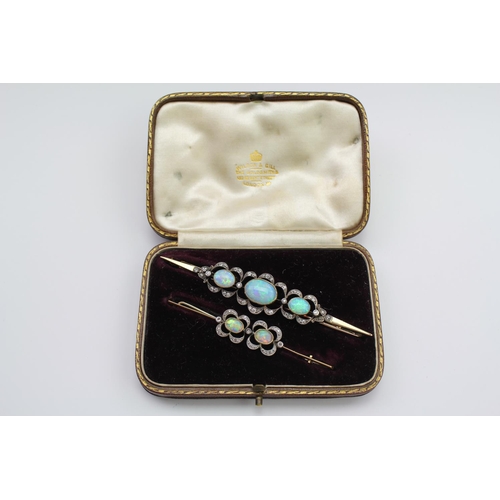 234 - Two Edwardian diamond and opal revival brooches, mounted in gold, contained in a fitted case. Larger... 