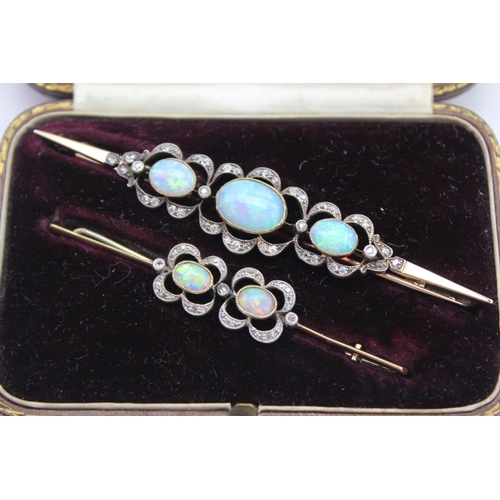 234 - Two Edwardian diamond and opal revival brooches, mounted in gold, contained in a fitted case. Larger... 