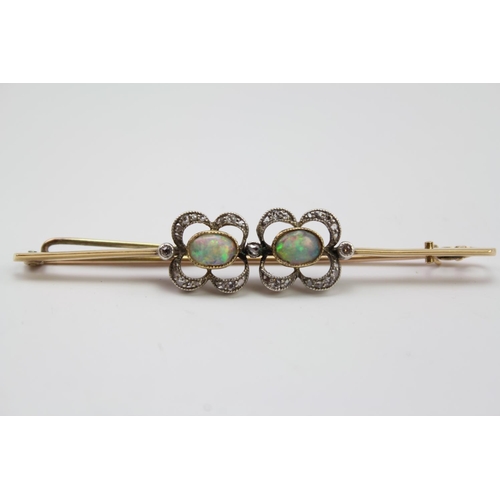 234 - Two Edwardian diamond and opal revival brooches, mounted in gold, contained in a fitted case. Larger... 