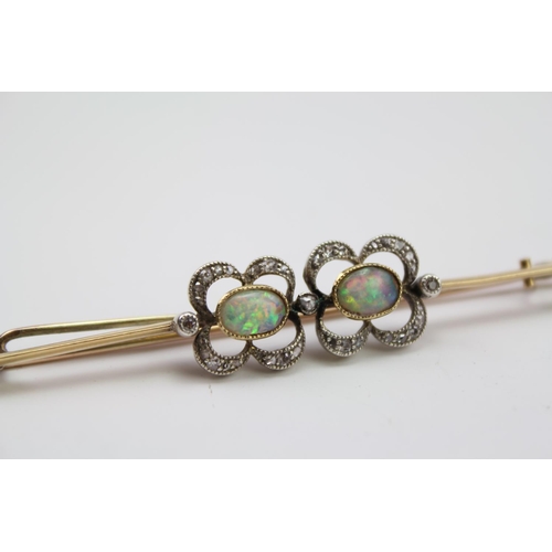 234 - Two Edwardian diamond and opal revival brooches, mounted in gold, contained in a fitted case. Larger... 