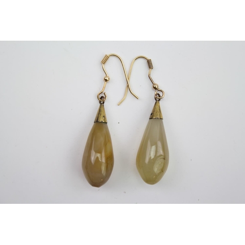 169 - A pair of Antique drop agate earrings on pieced loops. Weight approximately 9.7g.