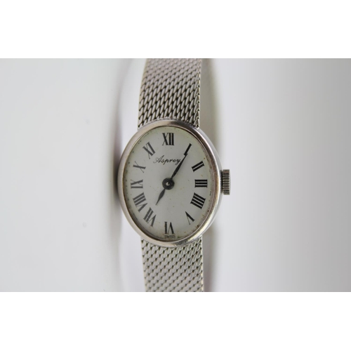 100 - Asprey's of London 18ct White Gold Wristwatch on a Milanese strap. Weight approximately: 32.2g.