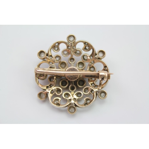 220 - A Victorian 9ct Gold, Silver, diamond mounted floral spray brooch, mounted with approximately 52 dia... 