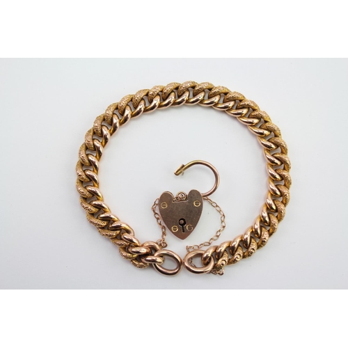 190 - A ladies 9 carat Gold curb bracelet, with every link hallmarked and designed, and matching padlock o... 