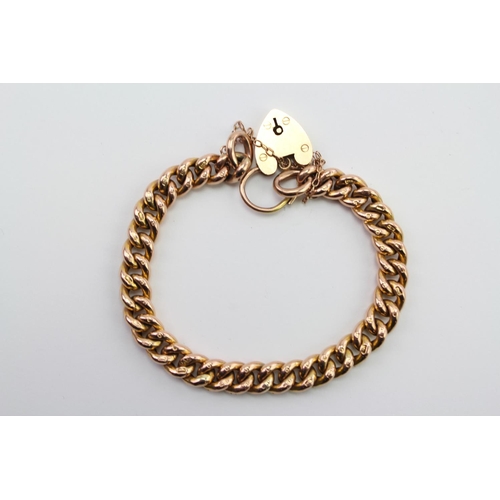 190 - A ladies 9 carat Gold curb bracelet, with every link hallmarked and designed, and matching padlock o... 