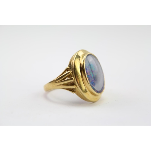 205 - A Ladies 18ct Gold cloudy Opal Set Ring. Weighing approximately 9.4 Grams. Size approximately R.