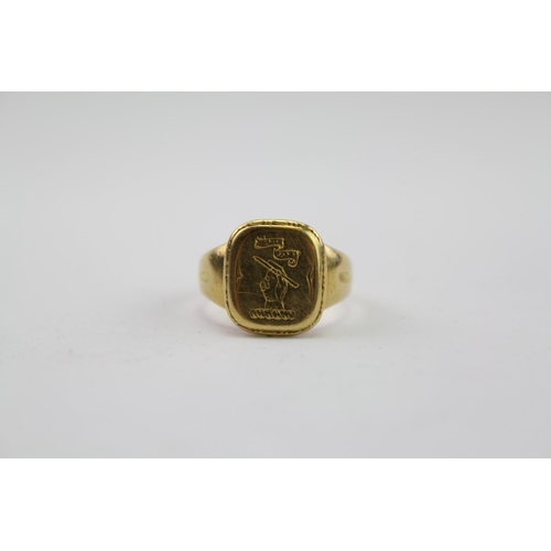 206 - A Ladies Gold Ring mounted with a Cufflink. Weighing approximately 4 grams. Size approximately I.