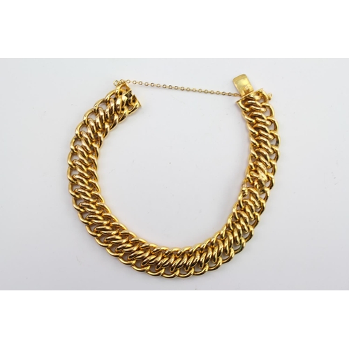 224 - A Ladies 18ct Gold Twisted Link Bracelet. Damage to the bracelet. Weighing approximately 29 grams.