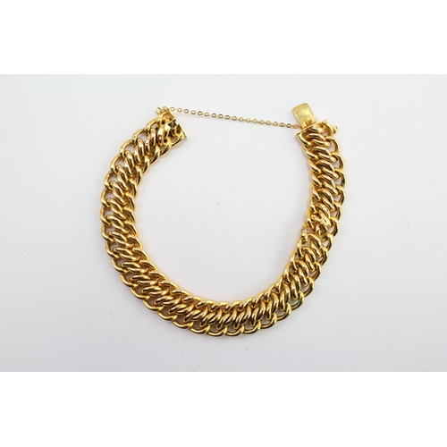 224 - A Ladies 18ct Gold Twisted Link Bracelet. Damage to the bracelet. Weighing approximately 29 grams.