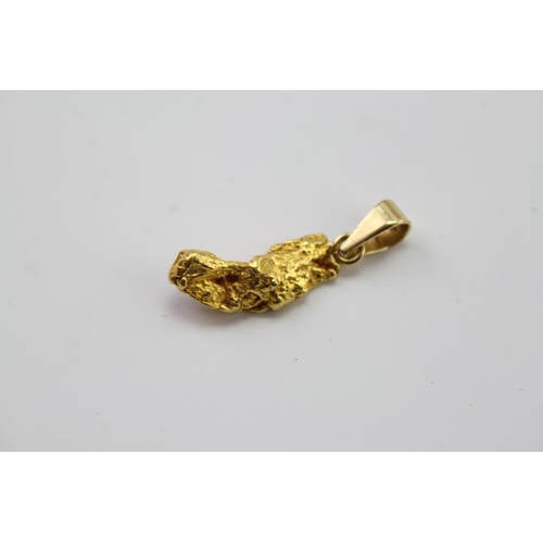 209 - A Gold nugget mounted as a pendant. Weighing Approximately 3.9g