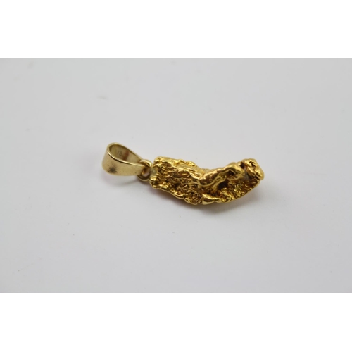 209 - A Gold nugget mounted as a pendant. Weighing Approximately 3.9g