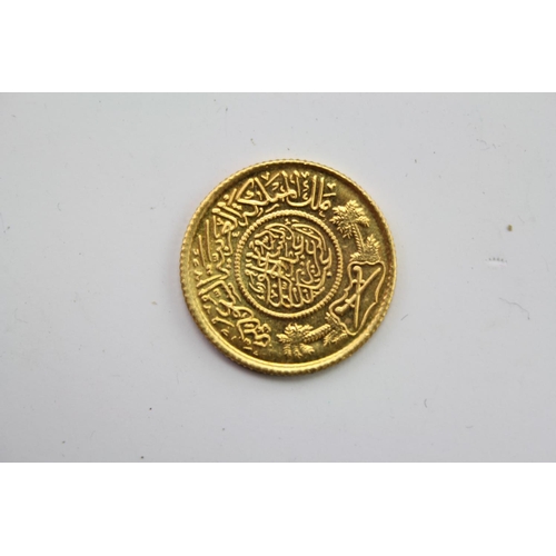 85 - A 1950s 22ct Gold Saudi Arabia Guinea Coin. Weighing Approximately 8.1 grams.