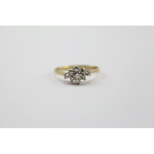 230 - A 9ct Gold diamond ring, set with 9 diamonds. Weighing approximately 2.3g. Size M.