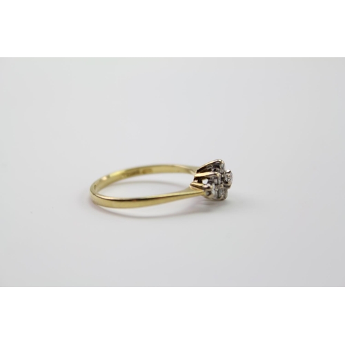 230 - A 9ct Gold diamond ring, set with 9 diamonds. Weighing approximately 2.3g. Size M.