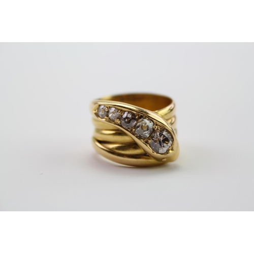 210 - A 18ct yellow Gold snake ring, the head mounted with 5 round and cushion shaped old cut diamonds, gr... 