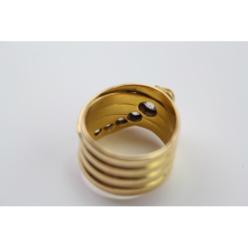 210 - A 18ct yellow Gold snake ring, the head mounted with 5 round and cushion shaped old cut diamonds, gr... 