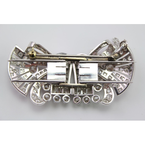 231 - A Ladies Platinum diamond set brooch, mounted with two fold over prong clips, set with 130 Diamonds ... 