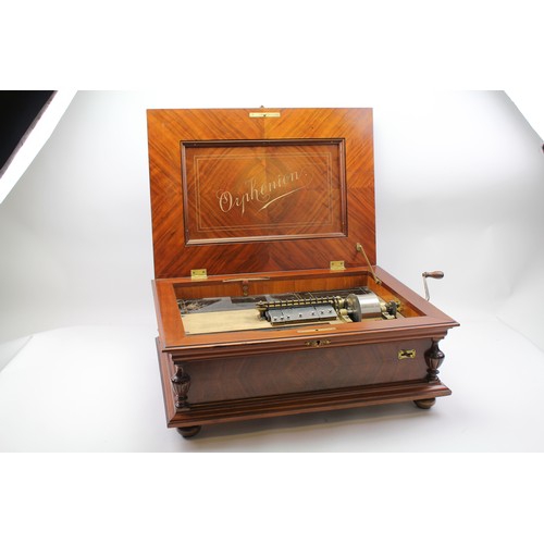 94 - An 18th Century mahogany Orphenion Music Box in full working order, along with various discs, fitted... 