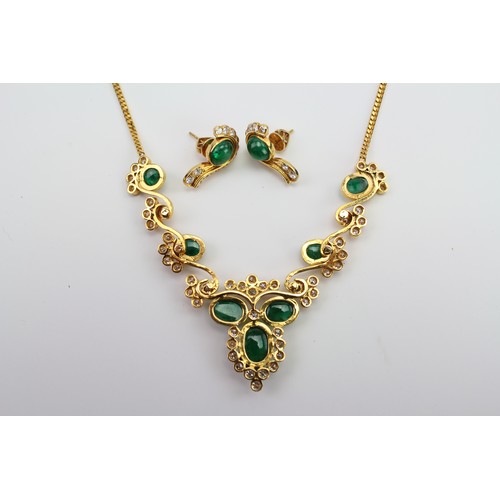 176 - A Hong Kong made 22ct Gold, 50 diamonds and seven green stones mounted necklace, along with matching... 