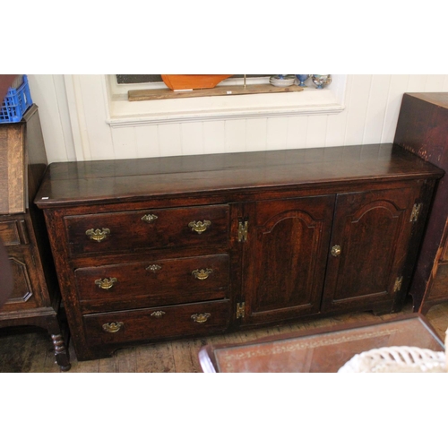 408 - An Antique Oak Lancashire Dresser Base with H shaped hinges, graduated Drawers & Cupboard. Measuring... 