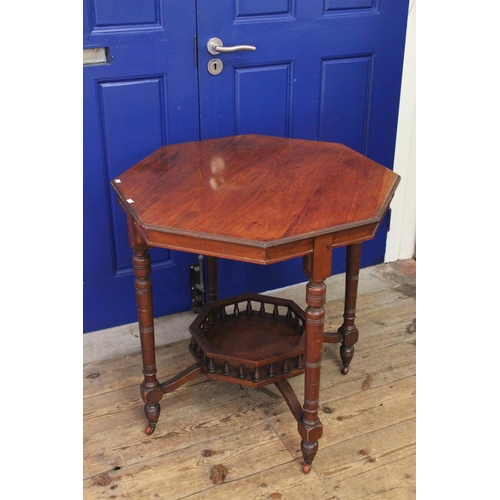 410 - An Edwardian Hexagonal Topped Drawing Room Table with a Jardiniere Under Tier. Measuring 70 cms acro... 