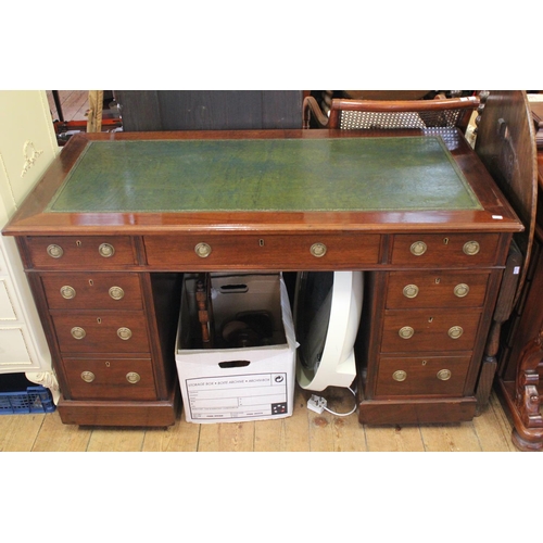 426 - A Late 19th Century Mahogany Pedestal Desk with fitted Drawers, Brass Drop Ring Handles and leather ... 