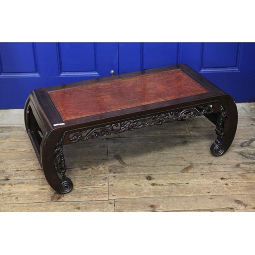 429 - A Chinese Hardwood Opium Table resting on curved legs. Measuring: 86 cms long x 42 cms wide x 33 cms... 