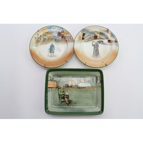 524 - A Royal Doulton Cottage scene pin tray along with Two Dickens Ware Plates. (AF).