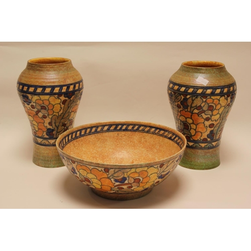 532 - A Pair of Charlotte Rhead 2681 vases along with a similar bowl.