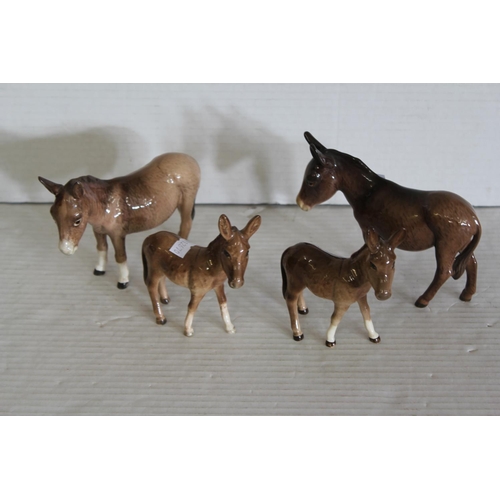 540 - Four various Beswick studies of donkeys.