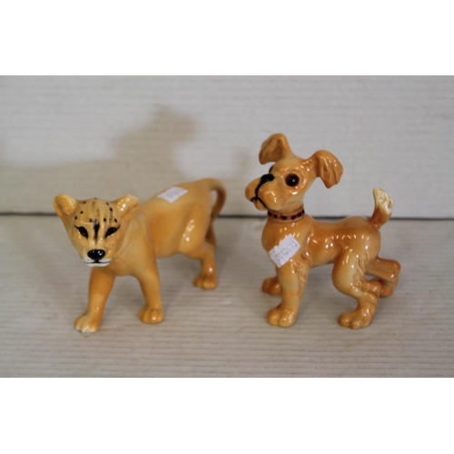 543 - A Rare Beswick study of a dog model no: 361 along with a study of a Cheater Cub.