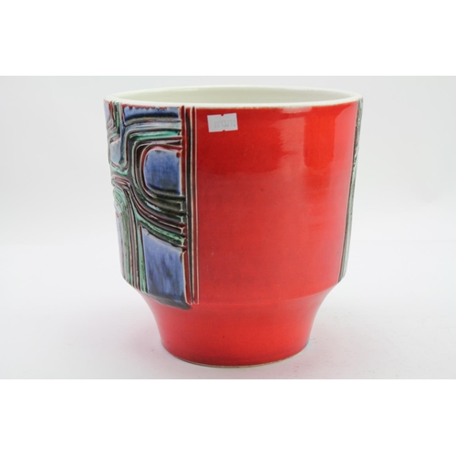 555 - A Delphis abstract pattern Jardiniere in Red. Measuring: 23 cms high.