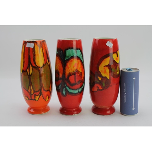 557 - A Collection of Three Delphis Vases in Orange, Blue & Green. Measuring: 21 cms high.