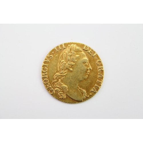 270 - A 1786 George III Gold Guinea, Reverse Crowned Shield of Arms. Weighing: 8.3 grams.