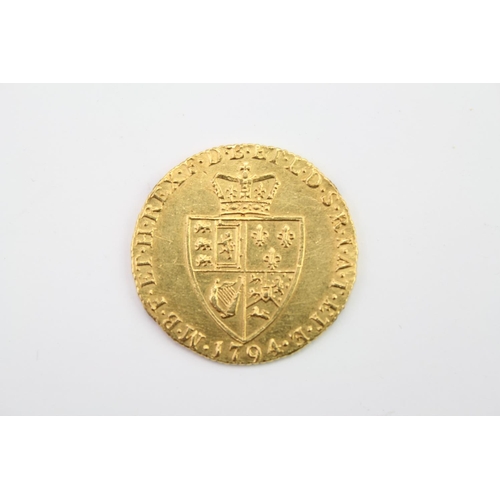 271 - A 1794 George III Gold Guinea, Reverse Crowned Shield. Weighing: 8.1 grams.