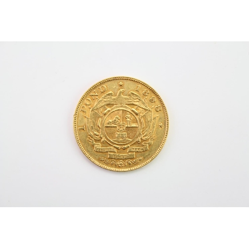 273 - An 1898 South African Gold One Pond. Bust of Kruger Left, Reverse Flag Draped Oval Arms, Banner Belo... 