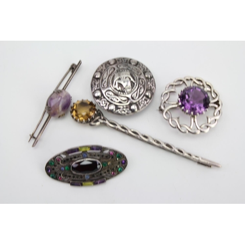 148 - An Art Deco Marquisette Brooch, a Celtic design Brooch, a Kilt Pin & other Scottish Jewellery.