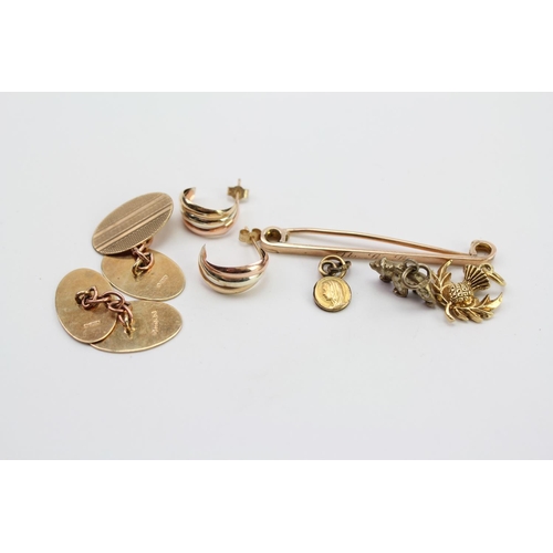 149 - A Pair of 9ct Gold engraved Cufflinks along with a Scottish Thistle Pendant, etc. Weighing: 7.9 gram... 