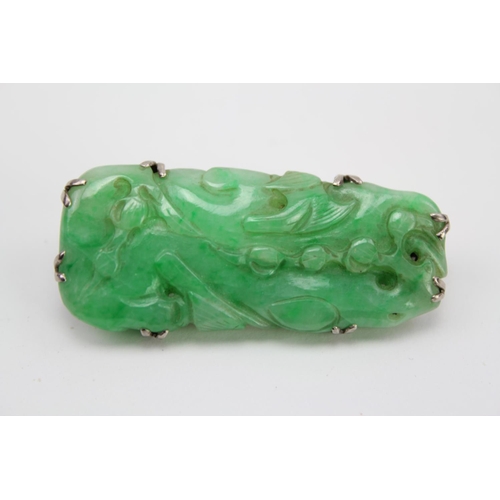 150 - A Green Jade mounted Brooch.