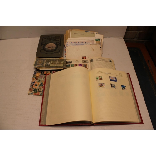 291 - A Stamp album containing worldwide stamps along with bank notes.