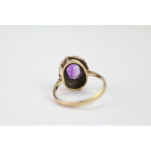 168C - A Victorian Amethyst & Seed Pearl Dress Ring. Size m. Weighing: 2.8 grams.